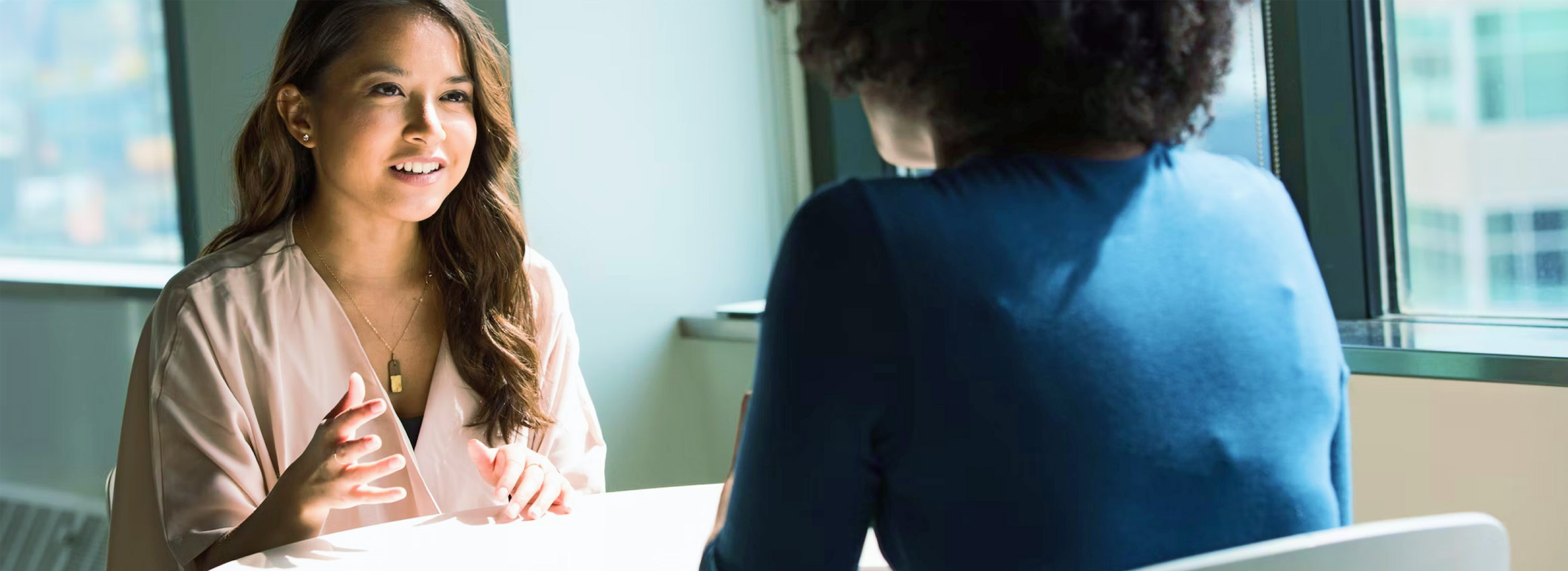 Two Women in a Meeting 1